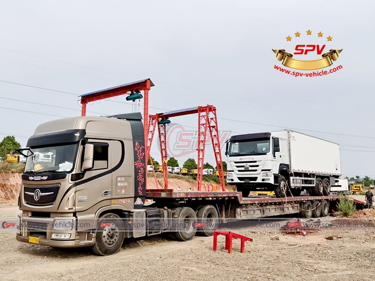1 Unit of Van Truck Loading onto flatbed truck in SPV factory